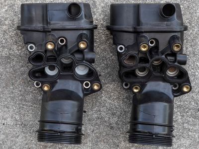 Oil Filter Bracket 06F 115 397 H Front  New on the Left and Old on the Right