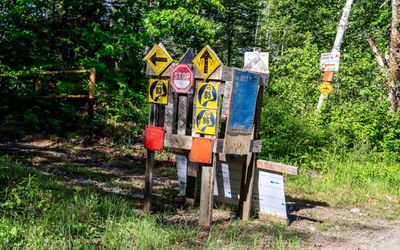 Undeveloped and snowmobile route signs outside of Katahdin Woods and Waters National Monument in Maine 