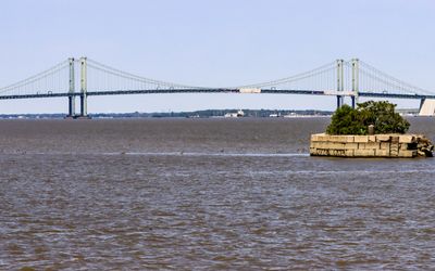 The Delaware Memorial Bridge and an ice breaking island in the Delaware River