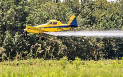 Crop duster in action near the Alligator River National Wildlife Refuge in eastern North Carolina