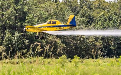 Crop duster in action near the Alligator River National Wildlife Refuge in eastern North Carolina 