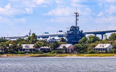 USS Yorktown aircraft carrier looms over a neighborhood in Charlestown South Carolina