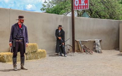 Wyatt and a wounded Virgil Earp at the Gunfight at the OK Corral