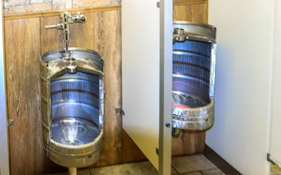 Keg urinals in Big Nose Kates Saloon in Tombstone ArizonaI sure hope thats not how beer is made!