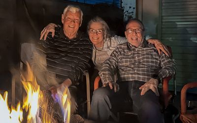 Don, Jennifer and me on the edge of the firepit at Jennifer and Steves New Year/Scotch party