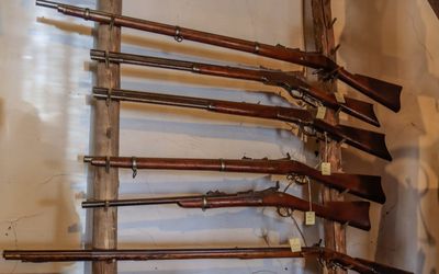 Long gun collection in the trading post in Hubbell Trading Post NHS