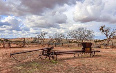 Farm equipment in the yard in Hubbell Trading Post NHS