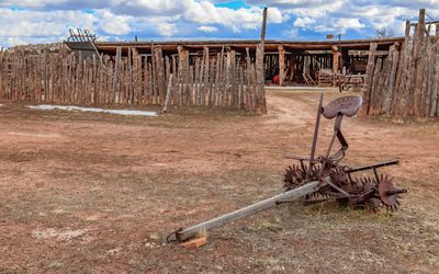 Farm equipment outside the shed area in Hubbell Trading Post NHS