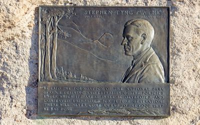 Stephen Mather plaque, one in every national park, along the Giant Logs Trail in Petrified Forest NP