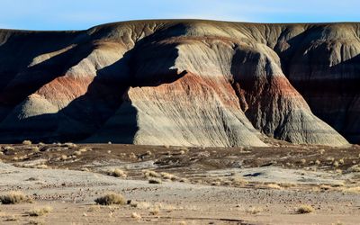 Late afternoon sunlight creates contrasts on the badlands in Petrified Forest NP