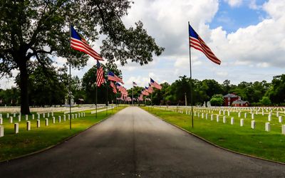 Flags line the main road at the National Cemetery in Andersonville NHS