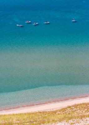 Paddle boarders from the Lake Michigan Overlook on the Pierce-Stocking Scenic Drive in Sleeping Bear Dunes NL