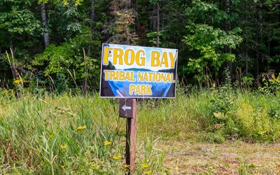 Park sign at the junction of Blueberry and Frog Bay roads in Frog Bay Tribal NP