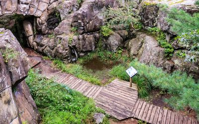 Devils Parlor, large merged potholes, along the Glacial Potholes Trail in Interstate State Park