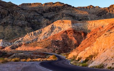 Early morning sunlight strikes a sandstone formation along the road in Valley of Fire SP
