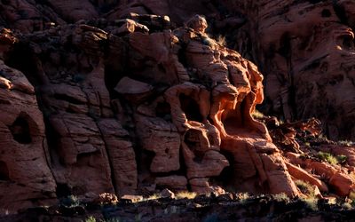 Sunlight paints the leading edge of a sandstone formation in Valley of Fire SP