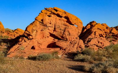 Early morning sunlight strikes a sandstone formation in Valley of Fire SP