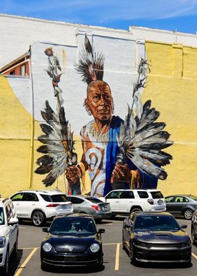 Large Indian mural overlooking a parking lot in Hot Springs, Arkansas