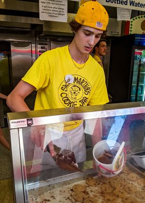Filling a bucket full of Sweet Marthas Cookies (an after lunch snack) at the Minnesota State Fair, Saint Paul
