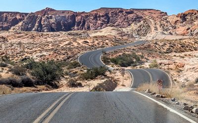 Dramatic winding, undulating road through Valley of Fire State Park, Nevada
