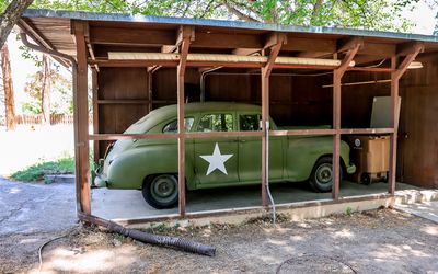 Military vehicle parked in the carport of the Oppenheimer home in Manhattan Project NHP
