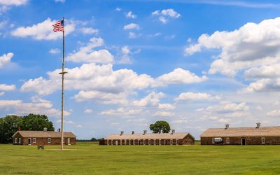New, old Commissary and the Quartermaster storehouse across the parade grounds in Fort Larned NHS