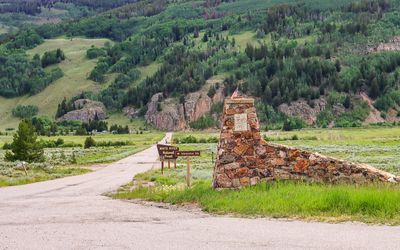 Entrance to Camp Hale with the Climbing Wall in the distance in Camp Hale NM