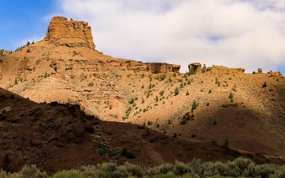 Rock formation rising above the canyon in Shoshone National Forest