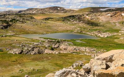 Lake in a rocky valley below the Beartooth Highway