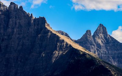 Rugged peaks high above as seen from the boat on Upper Waterton Lake in Waterton Lakes NP