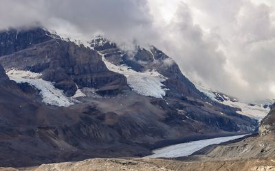 Clouds cover Mt Andromeda above the Athabasca Glacier in the Jasper NP Icefield