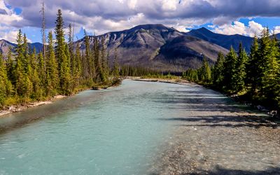 View of mountains and the Kootenay River from the Simpson Trail Bridge in Kootenay NP