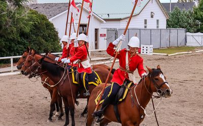 Member of NWMP team breaks off from the formation in Fort Macleod