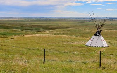 Teepee of the Blackfoot peoples against the surrounding area in Buffalo Jump WHS