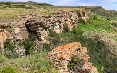 Head-Smashed-In Buffalo Jump kill site with the Calderwood Buffalo Jump in the distance in Buffalo Jump WHS