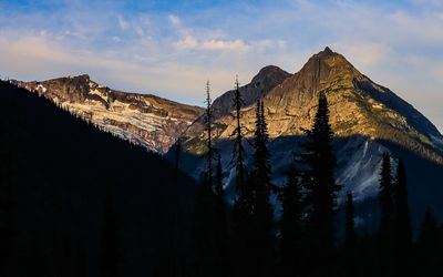 Early morning light on a mountain peak in Glacier NP