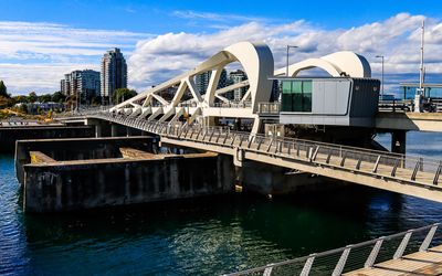 Johnson Street Bridge, a lift-bascule bridge, spanning Victoria Harbor in Victoria BC