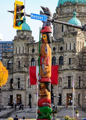 First Nation Totem Pole on the grounds of the Provincial Capital building in Victoria BC