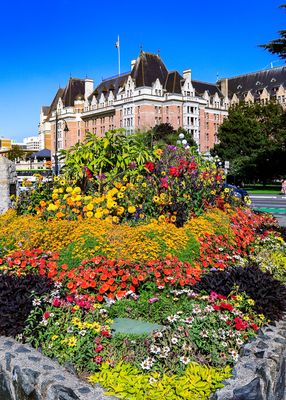 Flowers frame the Empress Hotel in Victoria BC