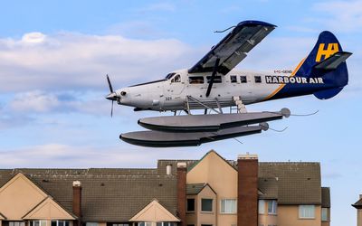 Float plane coming in for a landing on Victoria Harbor in Victoria BC
