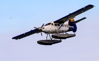 Float plane coming in for a landing on Victoria Harbor in Victoria BC