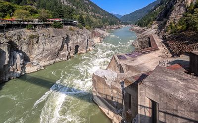 Complex, raging Fraser River and fishway at Hells Gate