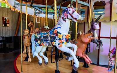 Rose Carousel hand-carved animals in Butchart Gardens