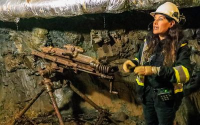Guide explains the tools used to mine at the Britannia Mine National Historic Site