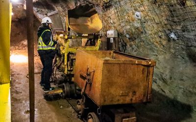 Demonstrating the loading of an extraction car at the Britannia Mine National Historic Site