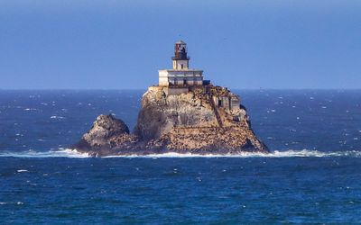 Tillamook Lighthouse (1879) on 120-foot Tillamook Rock as seen from Ecola State Park along the Oregon Coast