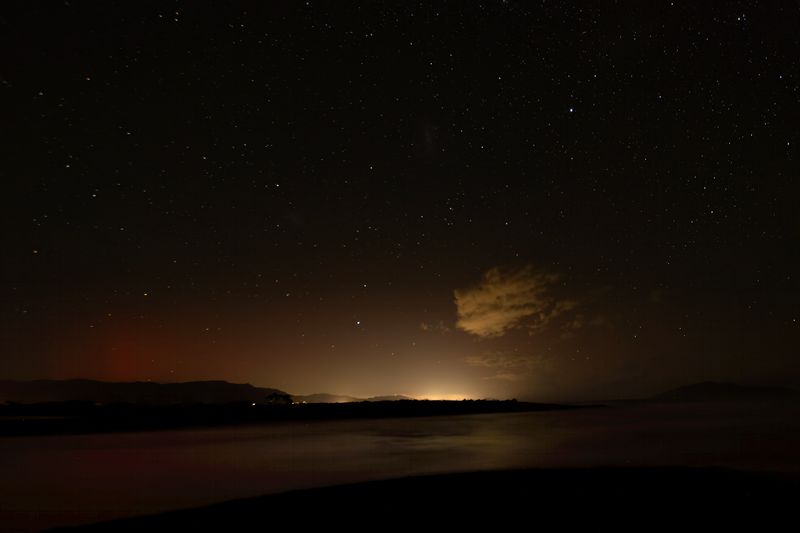 24 April 2023 - my very feeble attempt at capturing the Aurora Australis from the local river mouth. 