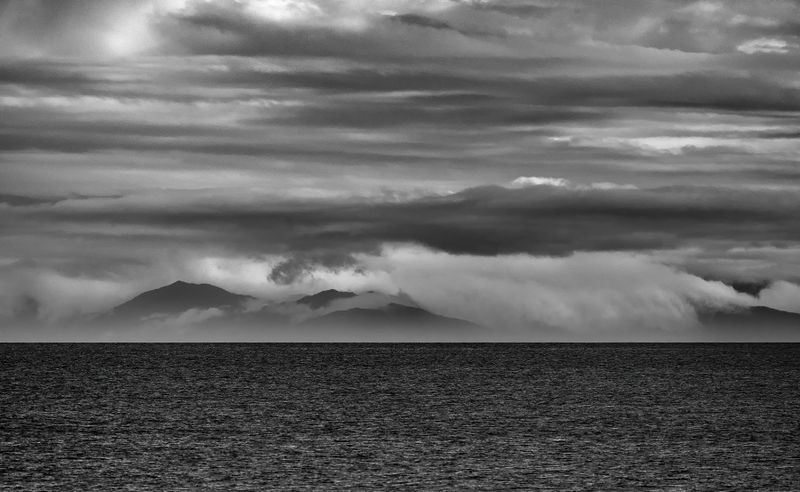from Ōtaki Beach, Across Cook Strait you can see D'Urville Island (approx 100km away). A telephoto lens helps