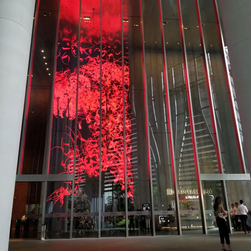 A large electronic panel on the elevator at Capita Spring kept changing the scenery
