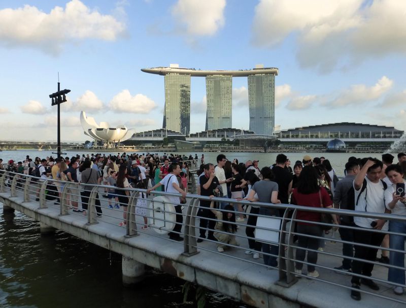  Crowded platform with Art/Science & Marina Bay Sands